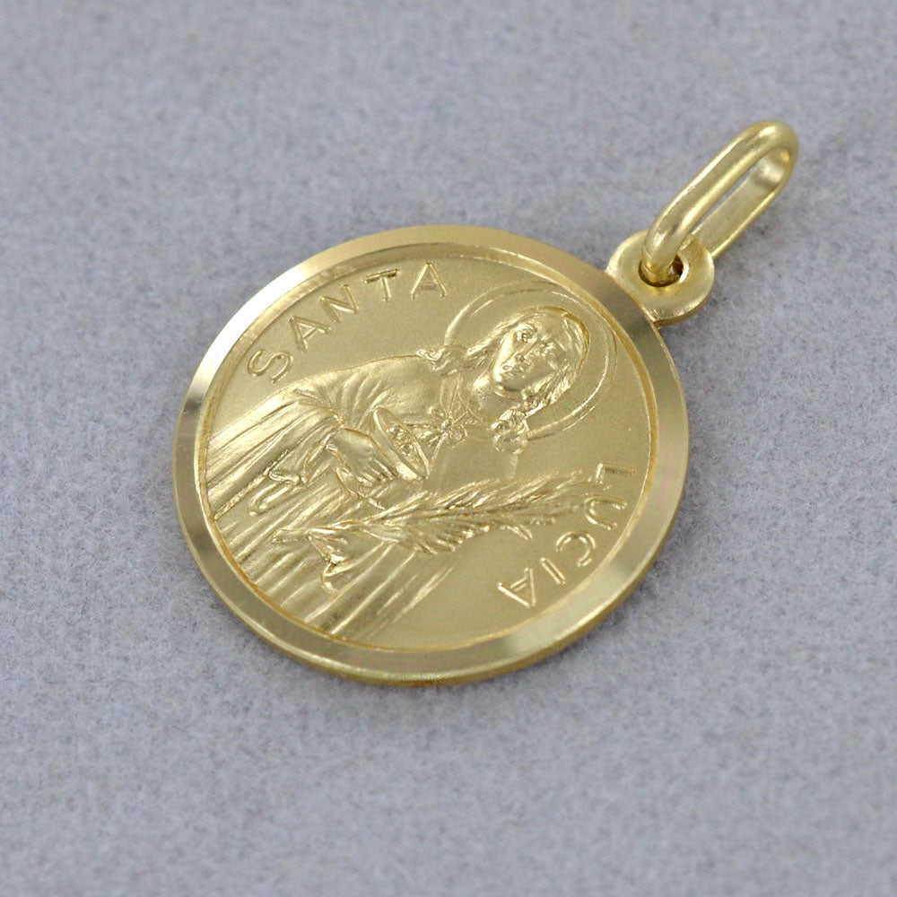 Medaglia Santa Lucia in oro giallo